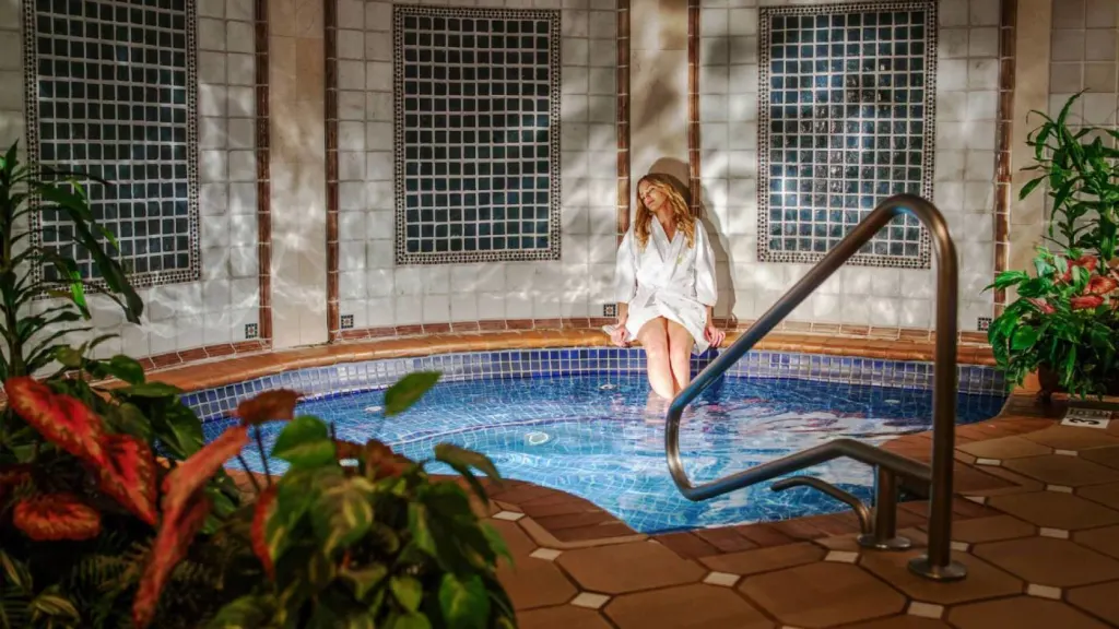 The Spa at Norwich Inn woman with feet in plunge pool